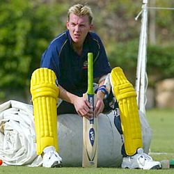 Brett Lee relaxes at training, June 2002